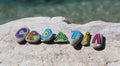 Croatia inscription, painted stones on the rock, adriatic sea in the background