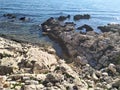 Croatia, island Pag, beautiful nature, rocky beach, breakwater in the background sea