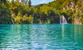 Croatia.Plitvice Lakes National Park.Turquoise water of the lake.The background is blurred. Royalty Free Stock Photo