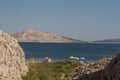 Croatia, Pag island, Rucica, beach, bay, grass, beach umbrella, relaxation, holiday, Europe, Island of Pag Royalty Free Stock Photo
