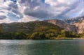 Croatia.View of the Cetina river and mountains on the bank.Blue sky with white clouds. Royalty Free Stock Photo