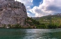 Croatia.View of the Cetina river and mountains on the bank.Blue sky with white clouds. Royalty Free Stock Photo