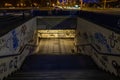 Croatia, Zagreb, June 21, the dark passage of a deserted, eerie creepy concrete indoor pathway grafted with graffiti at night