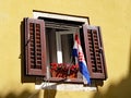 Croatian Flag Flying in Old Building Window, Split, Croatia Royalty Free Stock Photo