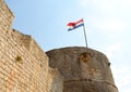 Croatian flag on Spanish Fortress in Hvar town on island of Hvar, Croatia Royalty Free Stock Photo