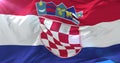 Croatian flag waving at wind with blue sky, loop