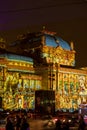 Croatian national theatre building during festival of light, coloured in colorful light animations