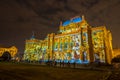 Croatian national theatre building during festival of light, coloured in colorful light animations