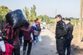 Croatian policeman from the border police watching migrants crossing the Serbia Croatia border in Berkasovo Bapska