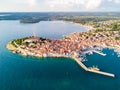 Croatian town of Rovinj on a shore of blue azure turquoise Adriatic Sea, lagoons of Istrian peninsula, Croatia. High bell tower.
