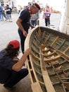 Croatian traditional shipbuilders are working on the restoration of an old wooden boat