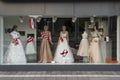 Croatian traditional white-and-red checked scarfs covering wedding dressess