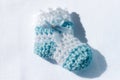 Crochet baby clothes as souvenirs for a first year birthday party