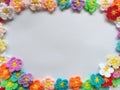 Crochet daisy flowers handmade crafts multi colored background texture Royalty Free Stock Photo