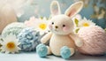 Crochet Easter bunny. Amigurumi pastel colors Easter rabbit and gentle spring flowers. Knitting concept. International