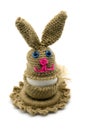 Crochet Easter bunny egg cup made of wool on white isolated back Royalty Free Stock Photo