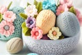 Crochet Easter eggs. Amigurumi colorful spring flowers and Easter eggs. Knitting concept. International Crochet Day