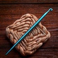Crochet hook on wooden background Royalty Free Stock Photo