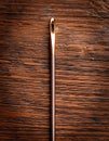 Crochet hook on wooden background Royalty Free Stock Photo