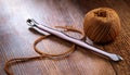 Crochet hook on wooden background Royalty Free Stock Photo