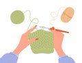 Crochet knitting process. Female hands with hook and thread. Balls of yarn. Top view of the workplace. Tailor shop Royalty Free Stock Photo