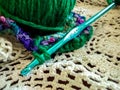 Crochet project with needle and ball of yarn Royalty Free Stock Photo