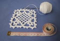 Crochet sample for tablecloth or napkin with meter.