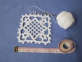 Crochet sample for tablecloth or napkin with meter.