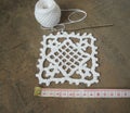 Crochet sample for tablecloth or napkin with meter.