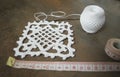 Crochet sample for tablecloth or napkin with meter.