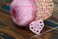 Crochet valentine heart with skein in wicker busket