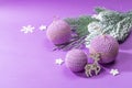 Crocheted Christmas balls and festive New Year decor in a fashion lilac very peri color