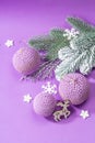 Crocheted Christmas balls and festive New Year decor in a fashion lilac very peri color