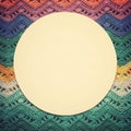 Crocheted multicolored cotton canvas. Round white frame for text