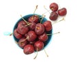 Crockery with ripe cherries. Isolated on a white background Royalty Free Stock Photo