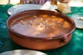 Crockpot with soup rice with fish and prawns