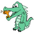 A crocodile eating small fish