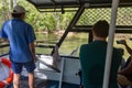 Crocodile feeding from the crocodile lagoon cruise boat, educative demonstration of crocodile attack