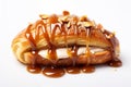 Croissant With Banana And Caramel On A White Background