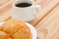 Croissant And Black Coffee Hot Morning Beverage Or Break Time. Royalty Free Stock Photo