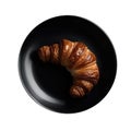 A Croissant On A Black Round Plate French Diners. Generative AI