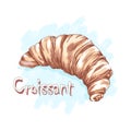Croissant on a blue abstract background.