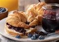 Croissant With Blueberry Jam and Blueberries Royalty Free Stock Photo