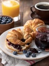 Croissant With Blueberry Jam and Blueberries Royalty Free Stock Photo