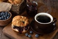 Croissant with blueberry jam and coffee Royalty Free Stock Photo