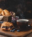 Croisant With Blueberry Jam and Cup of Coffee Royalty Free Stock Photo