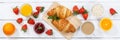 Croissant breakfast croissants orange juice coffee food wooden board from above banner Royalty Free Stock Photo