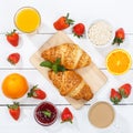 Croissant breakfast croissants orange juice coffee food wooden board from above square Royalty Free Stock Photo
