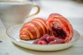 Croissant in a breakfast setting Royalty Free Stock Photo