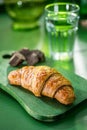 Croissant in a breakfast setting Royalty Free Stock Photo